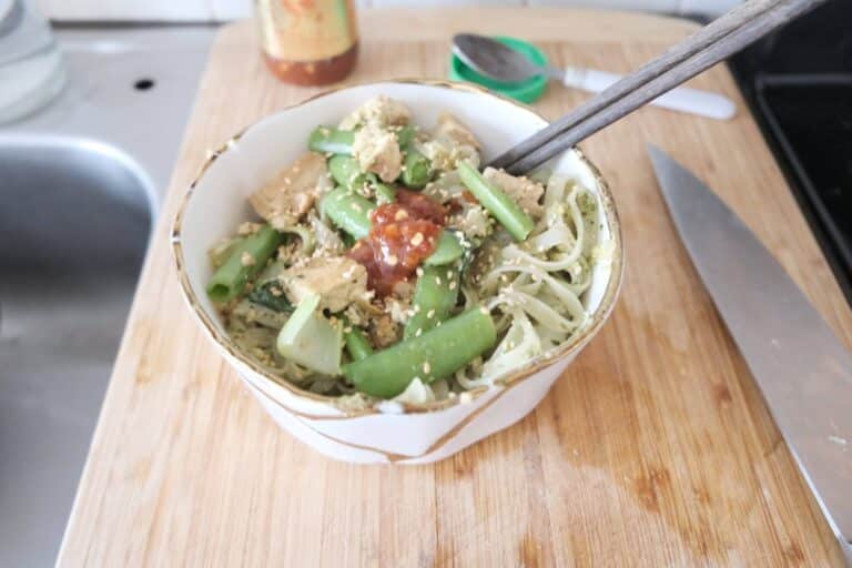 Spicy noodle bowl with snap peas