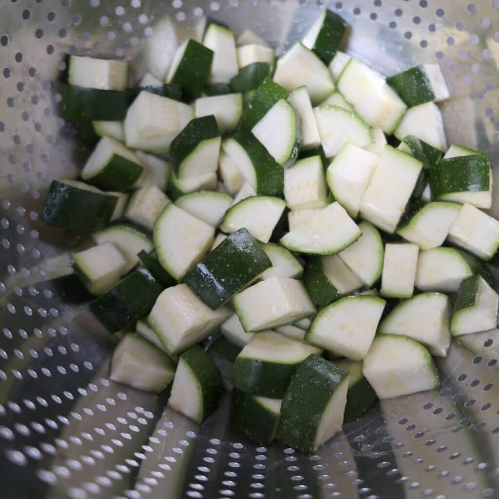 Cubed zucchini, salted and drained