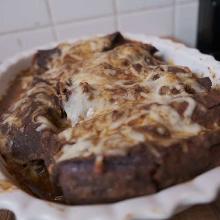 Birria enchiladas baked with cheese